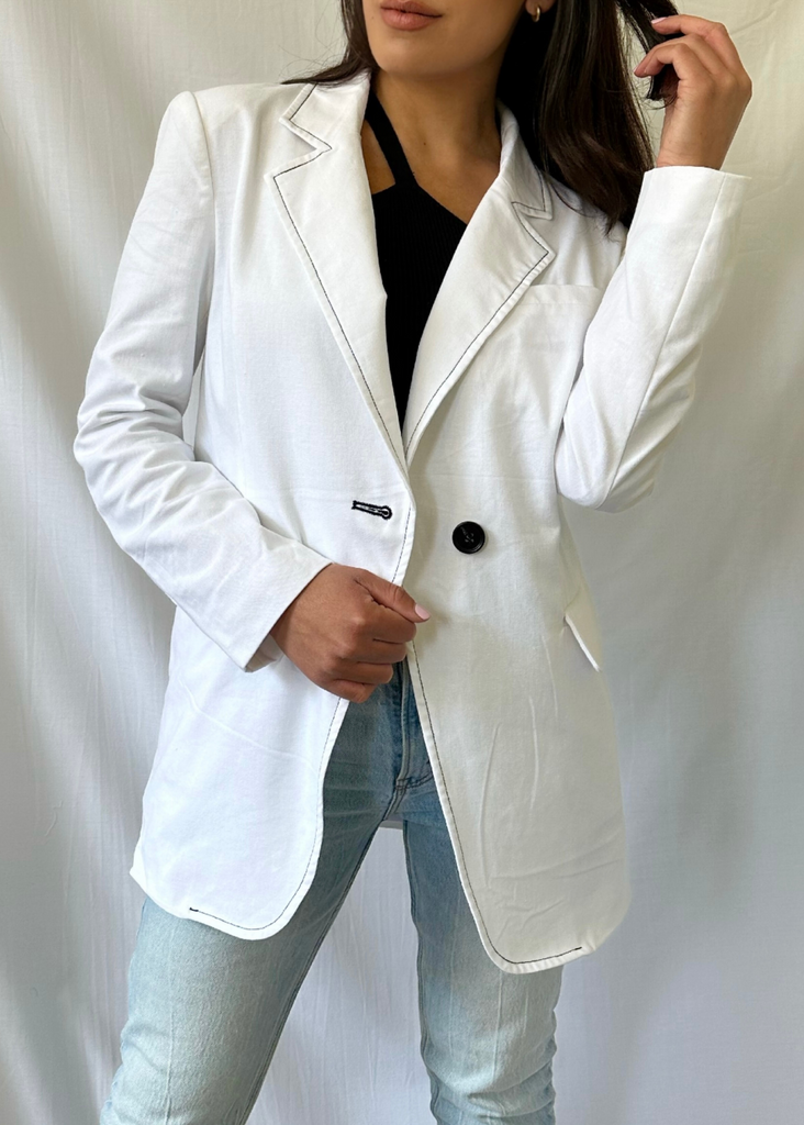 white blazer with black details